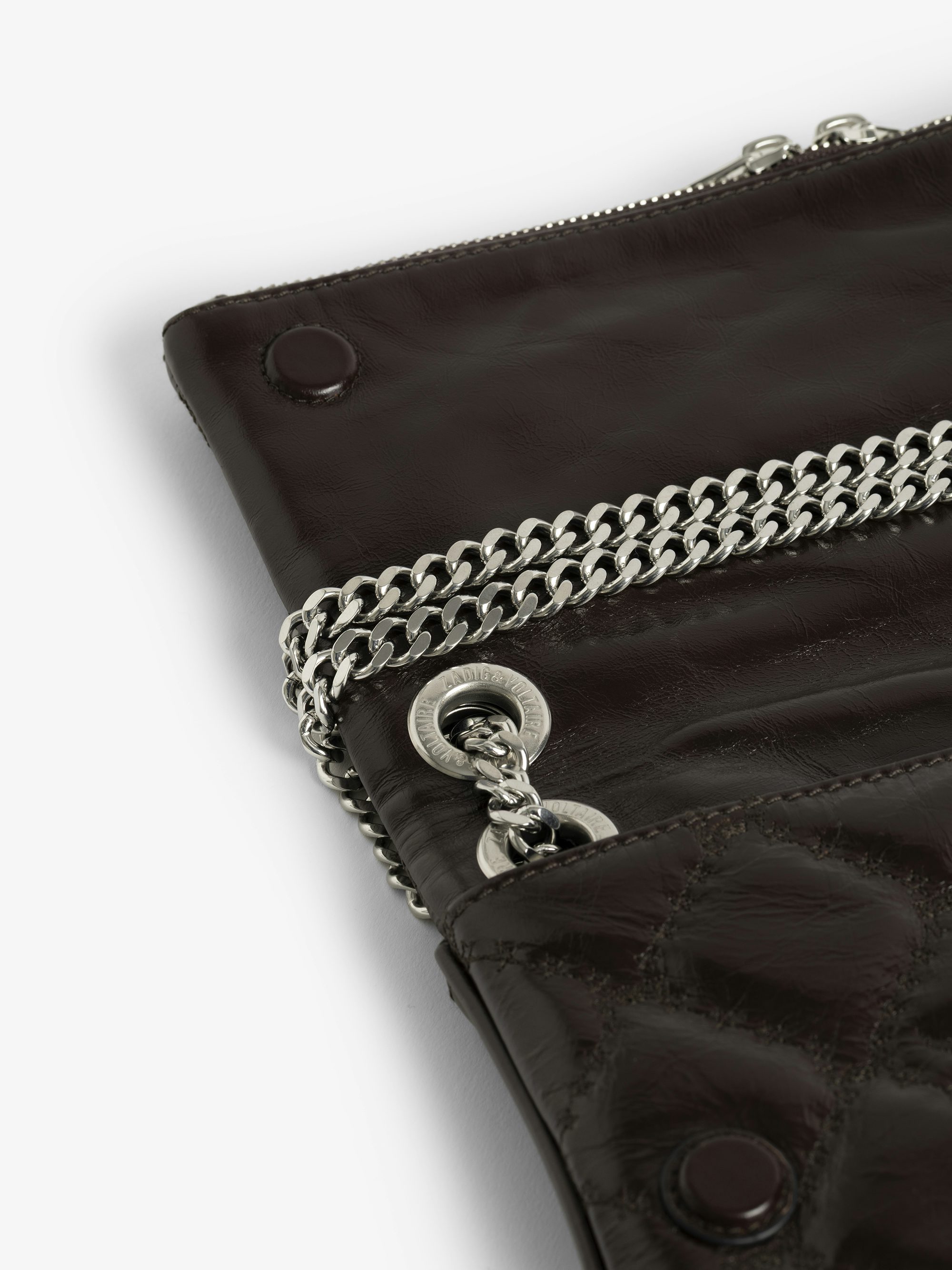 Rock II Vintage Monogram Clutch - Clutch in vintage quilted effect leather with sliding metal chain and signature wings.